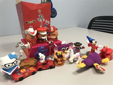 Mcdonald happy meal toys - Now, just a week after the official 100th anniversary on Oct. 16, McDonald’s has new limited-edition toys that Disney fans will race to collect. The Disney100 Happy Meals are now available for ...
